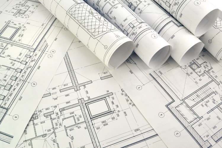 Close up of blueprints of a building to signify professional print options for businesses